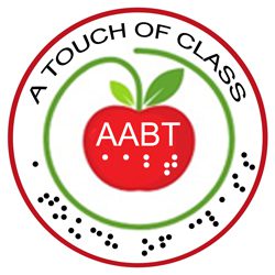 Logo for AABT A Touch Of Class Image of a circular logo with a red border; in the center of the logo is a red apple with green leaves, with a green stem that grows into an inner circular border that surrounds the apple. The letters AABT are written on the apple in white text, above the letters AABT in Braille, also in white. A Touch Of Class is printed in black text in an arch shape across the top, between the red and green borders; A Touch Of Class is also printed in black braille, arching between the red and green borders in the lower half of the logo.
